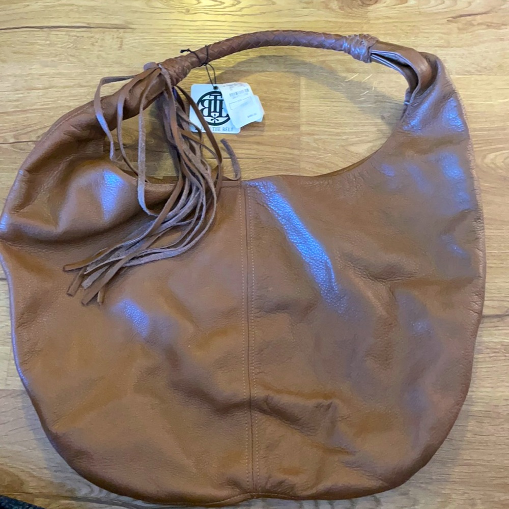 B-low the belt bag, never used!